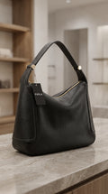 Furla — Hobo Bag | Deep black pebbled leather, never worn · Sz OS