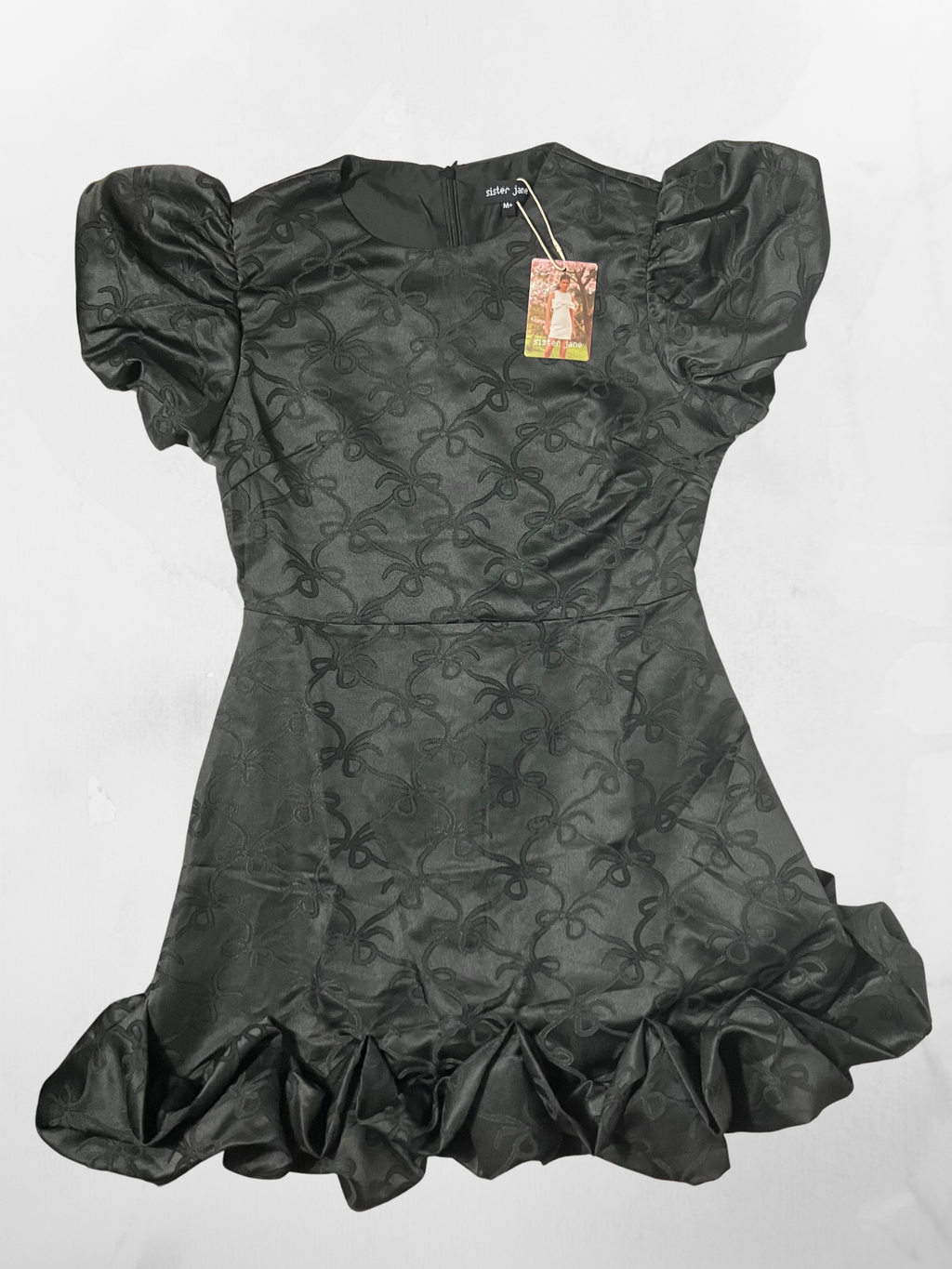 Sister Jane — Dress | London-designed bow jacquard with puff sleeves · Sz M