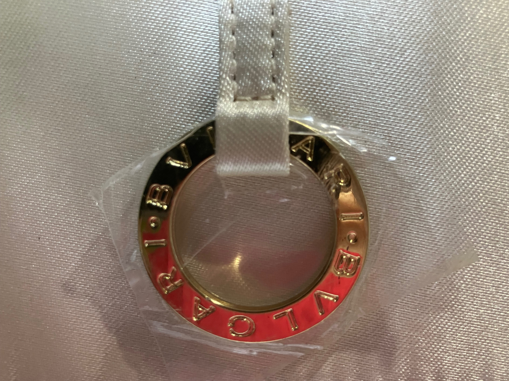 Emirates First Class x BVLGARI Amenity Kit – Cream Satin Cosmetic Clutch