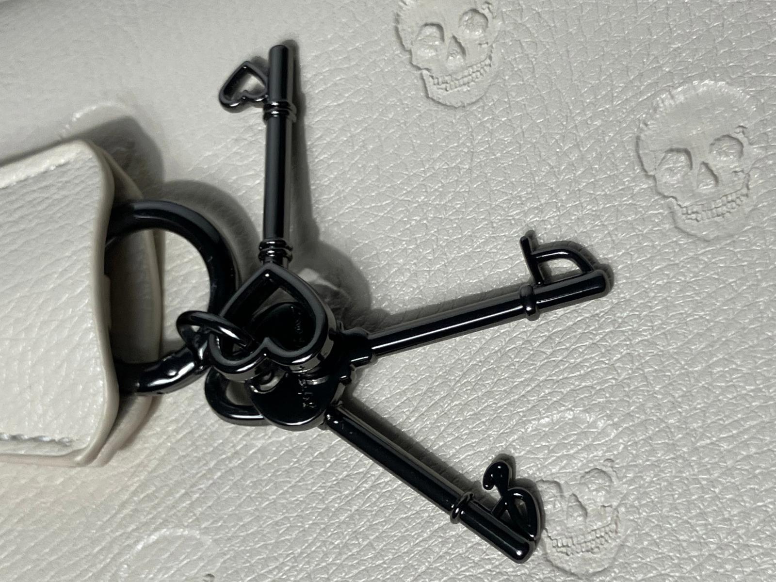 Betsey Johnson Embossed Skull Crossbody Bag - Cream