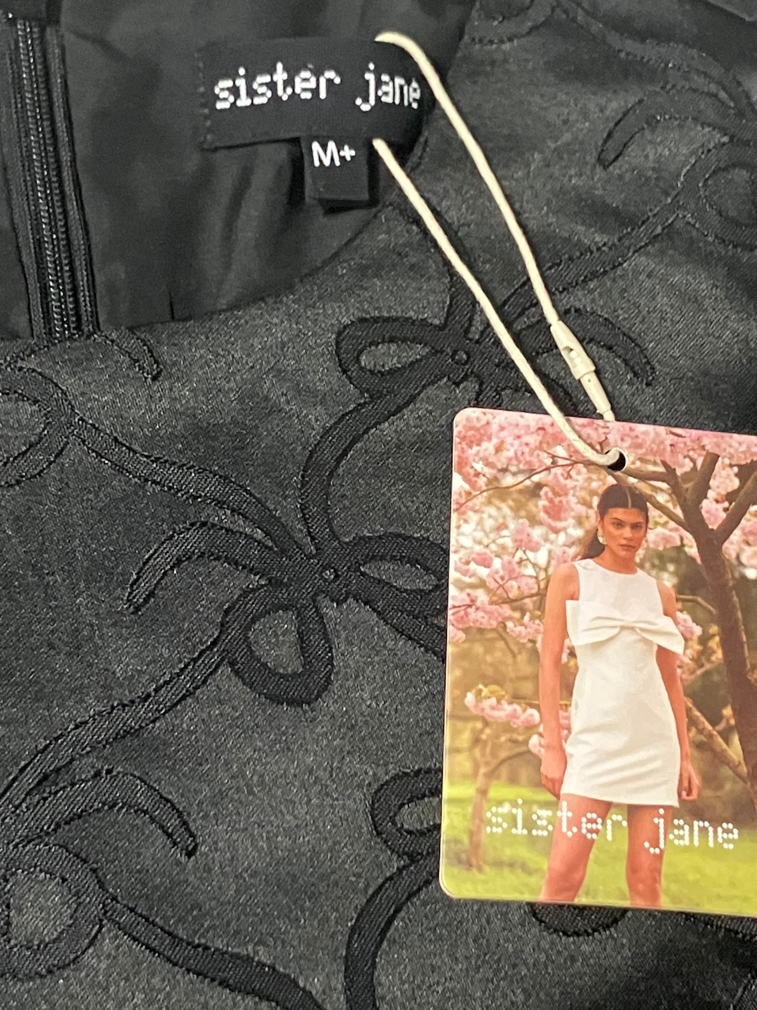 Sister Jane — Dress | London-designed bow jacquard with puff sleeves · Sz M