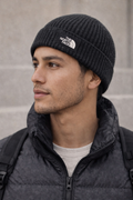 The North Face — Beanie | Deep black, ribbed knit, box logo · Sz OS