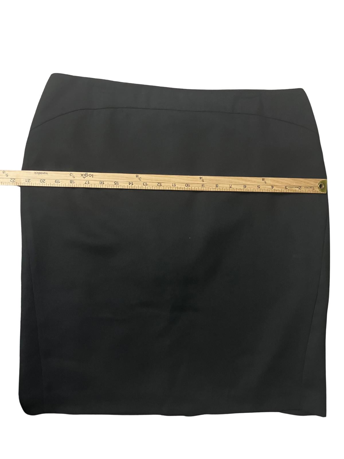 Ann Taylor — Pencil Skirt | Deep black, structured mini with wide waistband · Sz 16