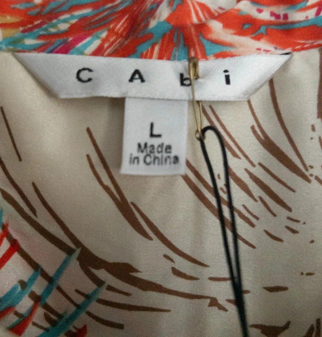 CAbi — Blouse | Feathers don't follow rules — and neither does this blouse · Sz L