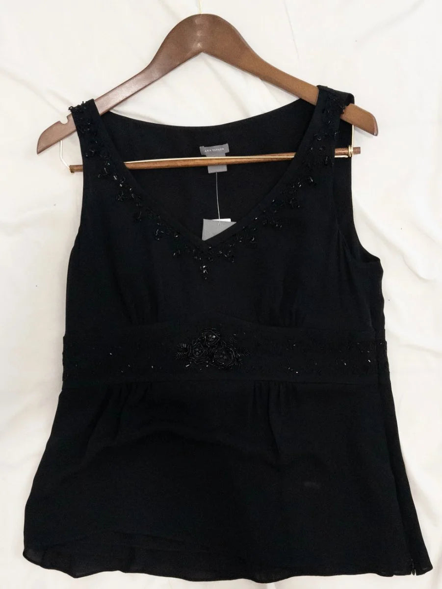 Ann Taylor — Blouse | Not every black blouse earns the room — this one does · Sz 10