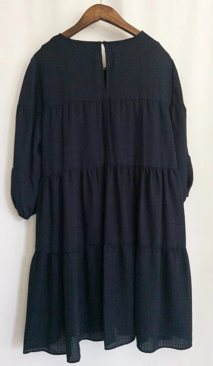 Calvin Klein — Dress | Not every dress asks for the room — this one takes it · Sz 14