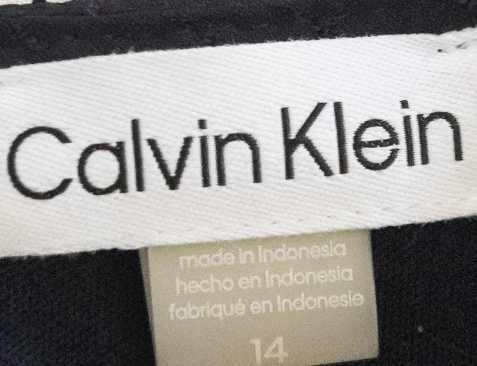 Calvin Klein — Dress | Not every dress asks for the room — this one takes it · Sz 14