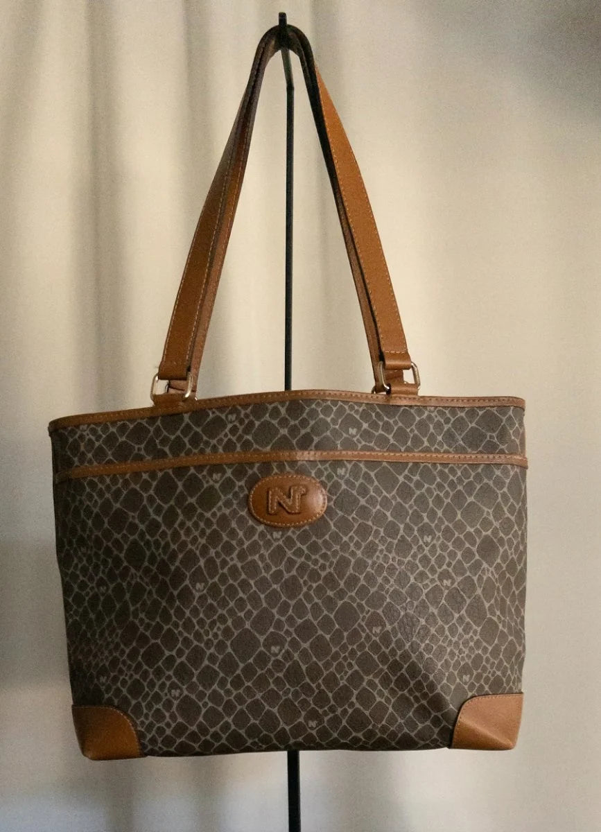 Nina Ricci - Bag - Coated canvas body with leather trim and handles - Sz OS - Curuva Front