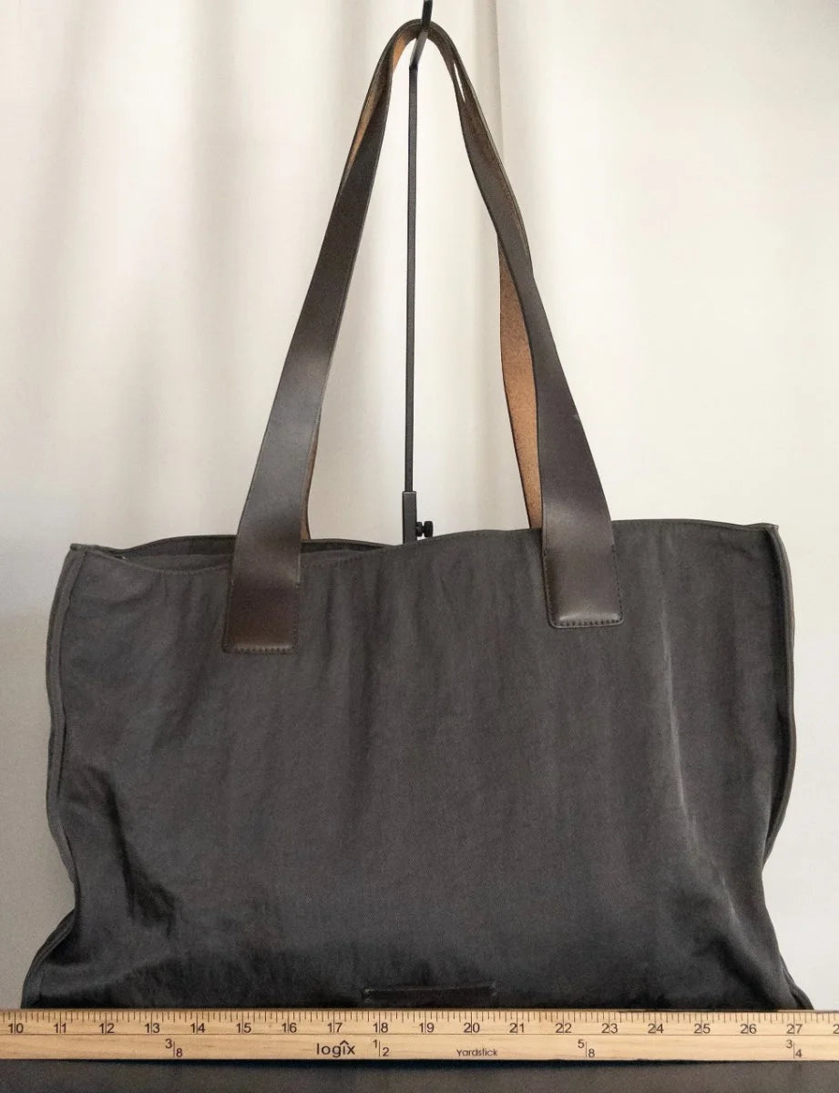 DKNY - Bag - Not visible on exterior canvas body with leather handles - Sz OS - Curuva Width